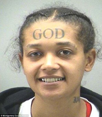 woman-arrested-god-forehead-tattoo.jpg